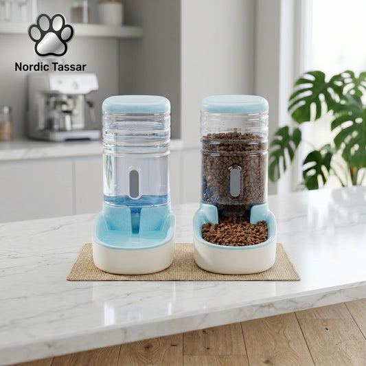 Blue and white Nordic Feast automatic gravity feeder and water fountain combo units displayed on a kitchen counter.