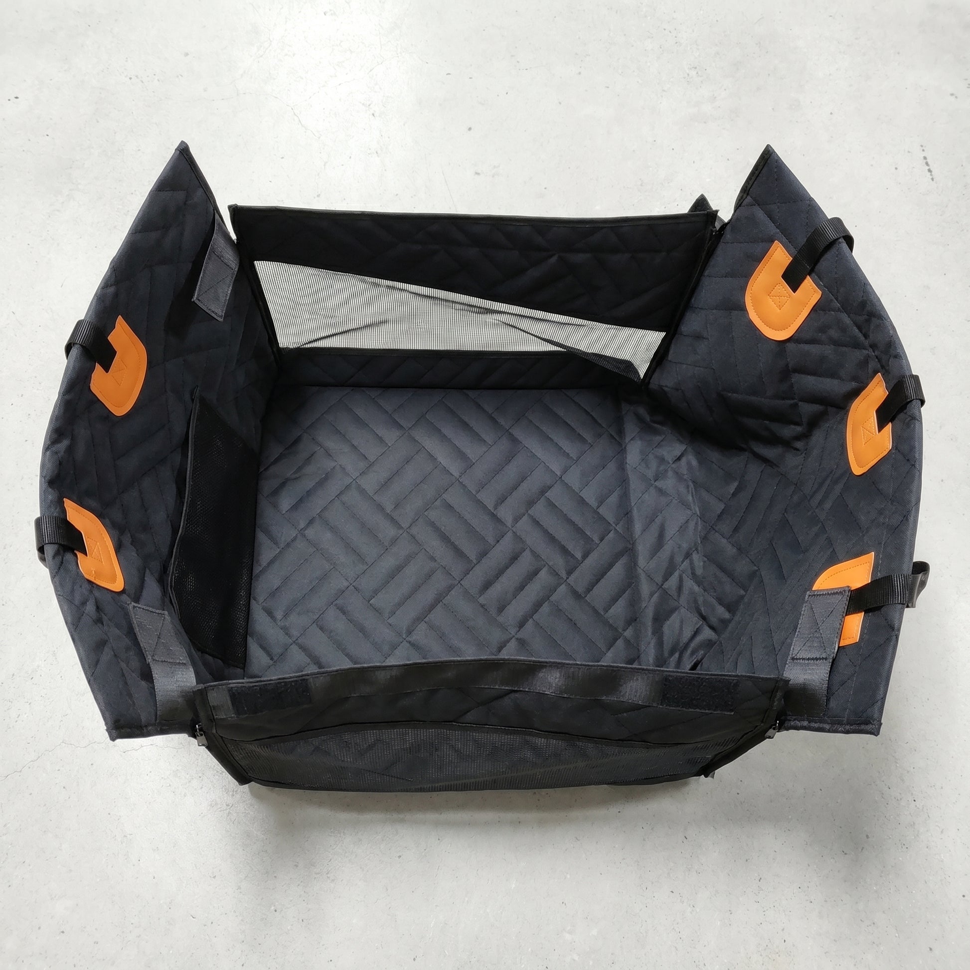 Overhead view of the Nordic Cloud travel bed interior, featuring waterproof lining and reinforced structure.