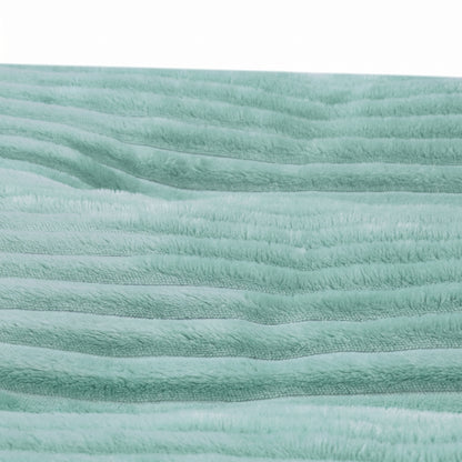 Close-up detailed view of the green corduroy textured fabric of the Nordic Slumber washable removable bed.