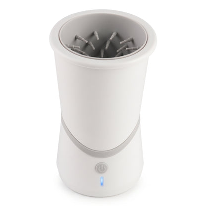 Studio product shot of the white PawCleaner Pro device with a power button.