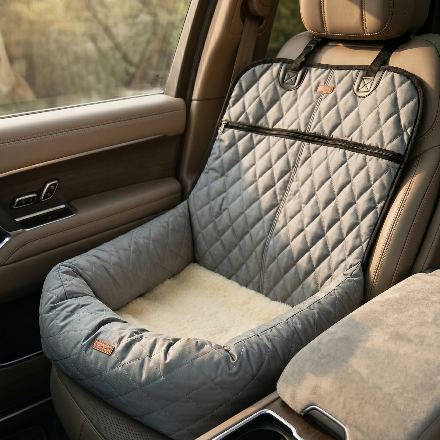 Nordic Throne Luxury Car Pet Suite installed in the back seat of a vehicle, featuring a quilted design.